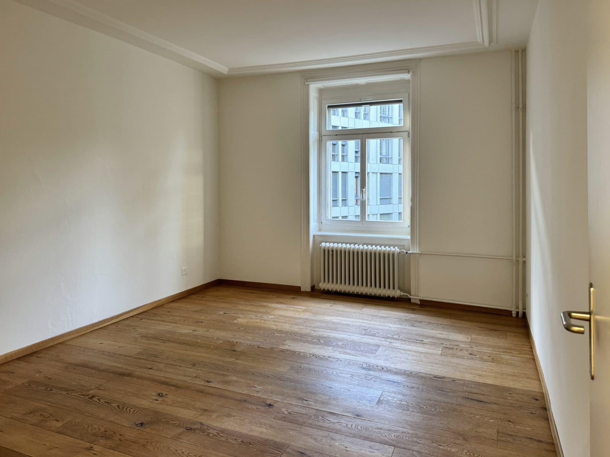 Office room with oak parquet and tall windows at Seestrasse 17/19